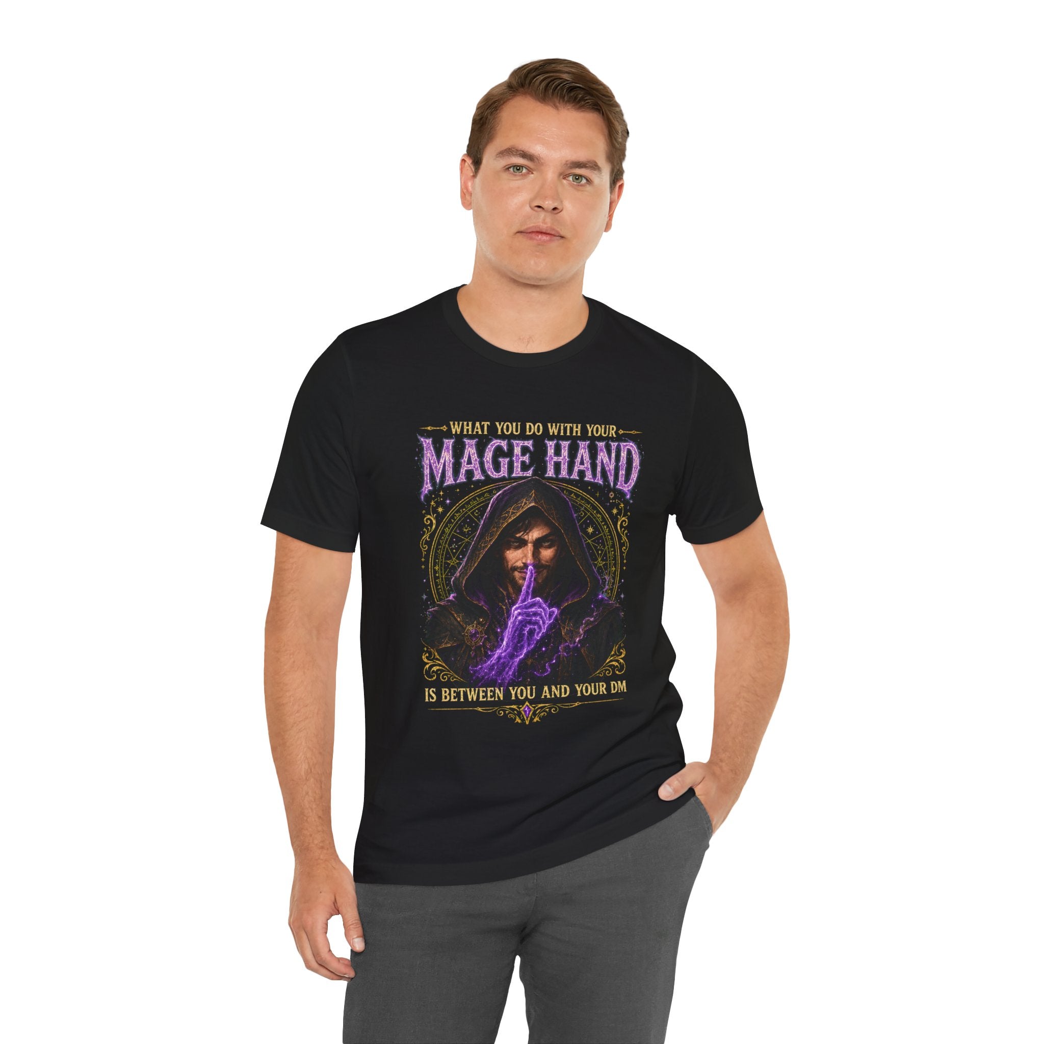 Mage Hand tabletop RPG graphic T-shirt, black shirt front view modeled with one hand in a pocket.