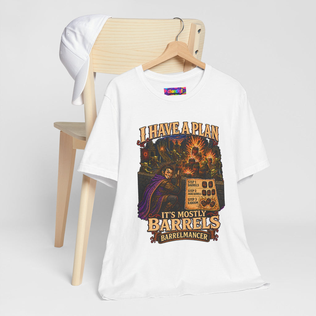 I Have a Plan Barrelmancer fantasy RPG graphic T-shirt, white shirt hanging beside a chair.