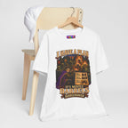 I Have a Plan Barrelmancer fantasy RPG graphic T-shirt, white shirt hanging beside a chair.