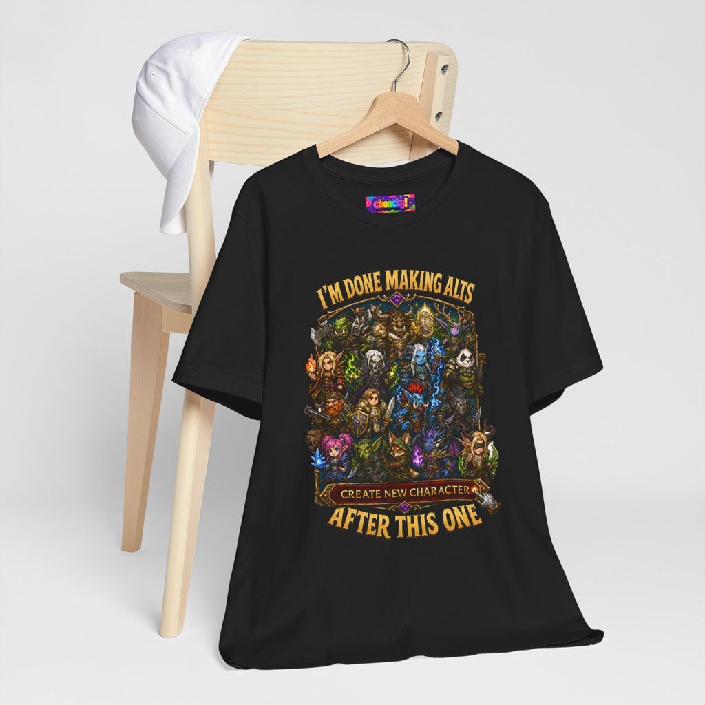 I'm Done Making Alts After This One fantasy MMO graphic T-shirt, black shirt hanging beside a chair.