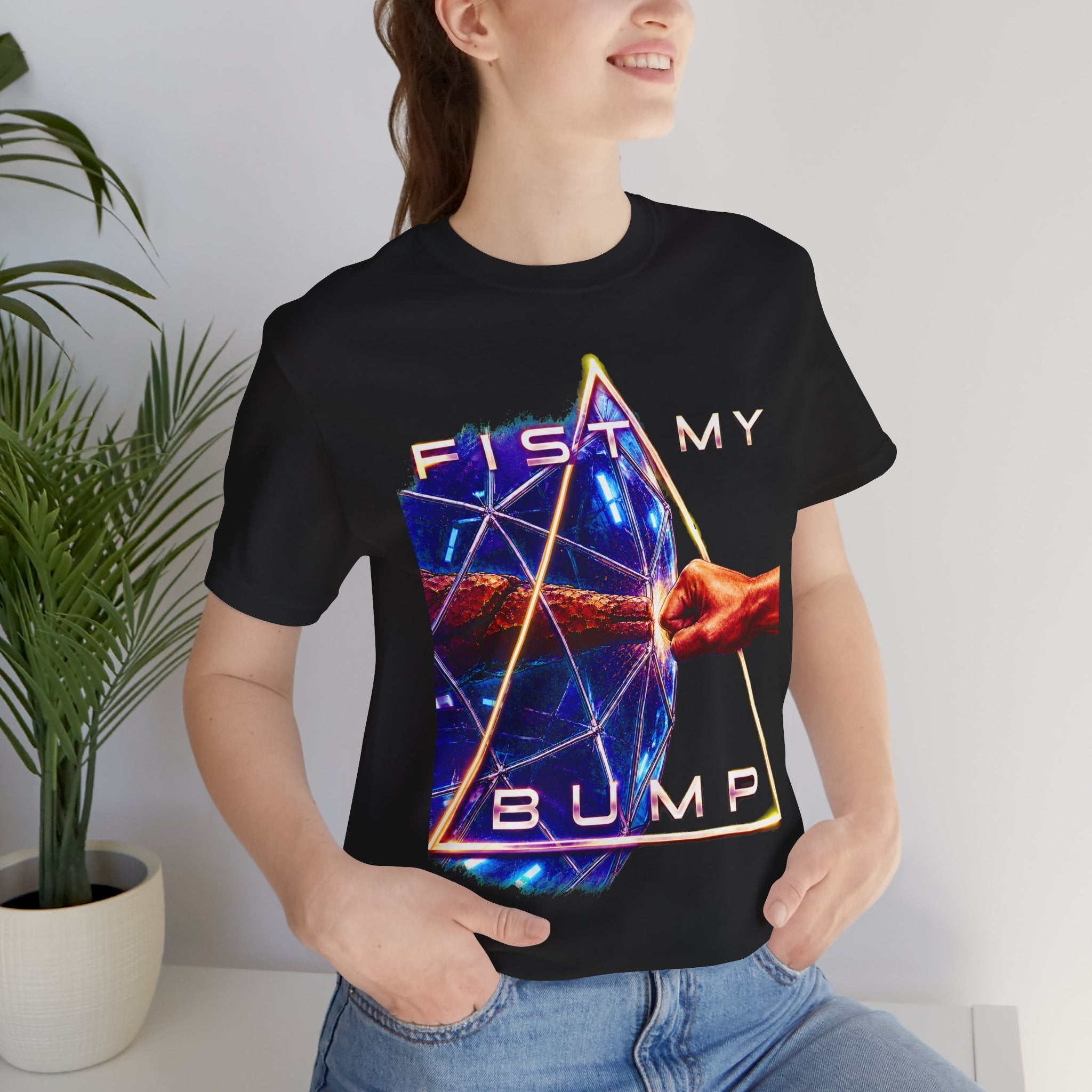 Fist My Bump Rocky and Grace sci-fi graphic T-shirt, black shirt close-up on a woman in a casual room.