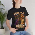 I Have a Plan Barrelmancer fantasy RPG graphic T-shirt, black shirt close-up on a woman in a casual room.