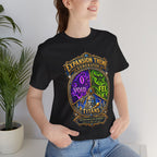 Expansion Theme Generator fantasy MMO graphic T-shirt, black shirt close-up on a woman in a casual room.