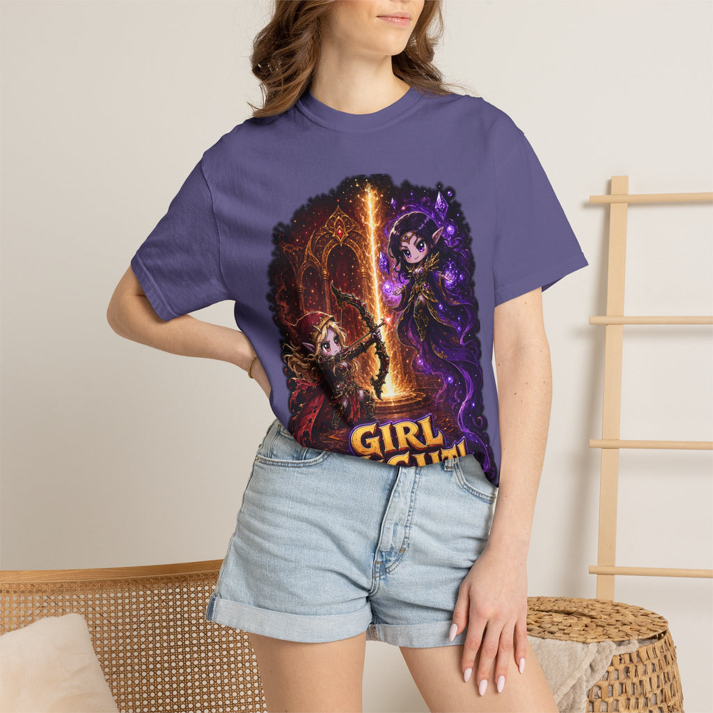 Girl Fight fantasy warrior duel graphic T-shirt, purple shirt modeled by a woman in a casual room.